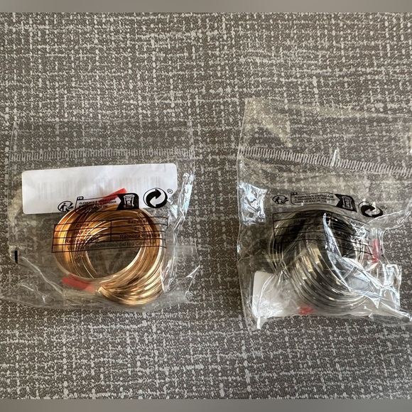 Set of two swirl earrings, gold, and silver - Picture 5 of 14